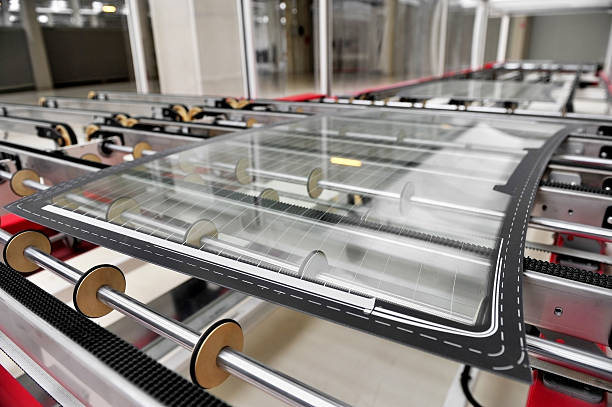 Industry detail with a rear car glass on the production line in a glass factory